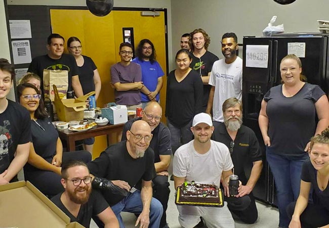 LetterStream employees gathered around at the Scottsdale location to celebrate the success of the mailhouse services for the quarter.