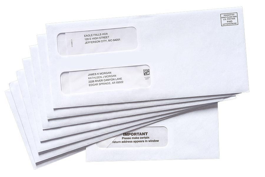 A stack of #10 envelopes with HOA statements included and a #9 return envelope for HOA community managers to send to HOA community members.