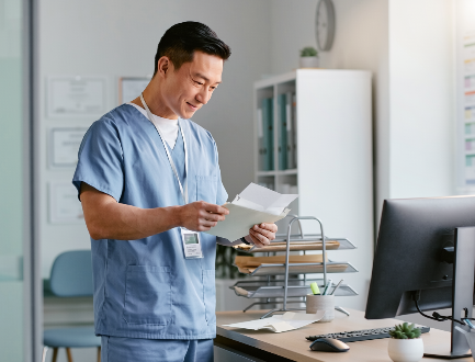 doctor looking at mail